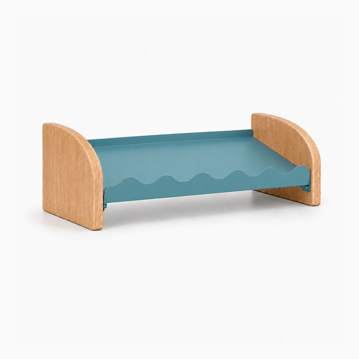 Kiddie Kicks Shoe Rack with solid wood side legs and steely blue powder-coated steel shelf featuring playful wave-shaped grooves for organized small shoes.