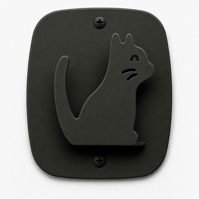 Kiddo Hooks wall hook in black metal shaped like a sitting cat, durable rust-resistant steel with minimalist design for functional wall organization.