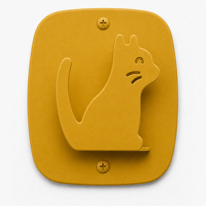 Kiddo Hooks wall hook in honey mustard color shaped like a cat, combining playful design with functional wall organization.