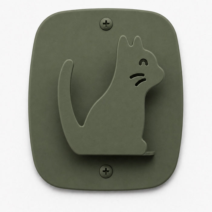 Minimalist olive-green wall hook in a playful cat shape made from durable material, part of the Kiddo Hooks collection for organizing and displaying items.