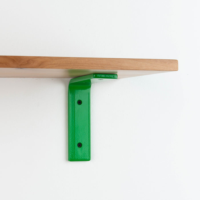 Leif Alder Wall Shelf with satin clear alder wood and vibrant green metal L bracket for sturdy wall-mounted display