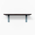 Leif Dutch Mocha Wall Shelf with solid alder wood in satin clear finish and wide blue metal L brackets for sturdy display