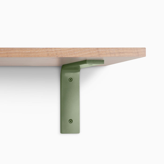 Leif Glazed White Oak Wall Shelf with satin clear alder wood and muted olive green metal L bracket for sturdy wall display