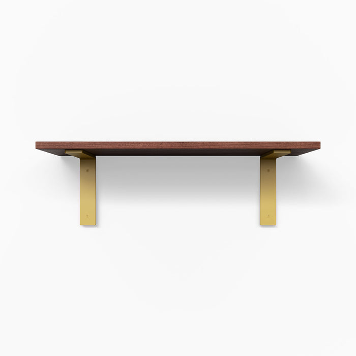 Leif Mahogany Wall Shelf featuring rich mahogany wood with matte gold metal floating shelf brackets for elegant wall display