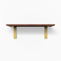 Leif Mahogany Wall Shelf featuring rich mahogany wood with matte gold metal floating shelf brackets for elegant wall display