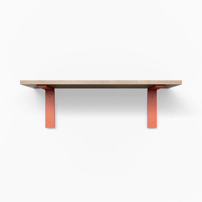 Leif Maple Wall Shelf with smooth maple glue-up and vibrant orange metal floating shelf brackets for functional display