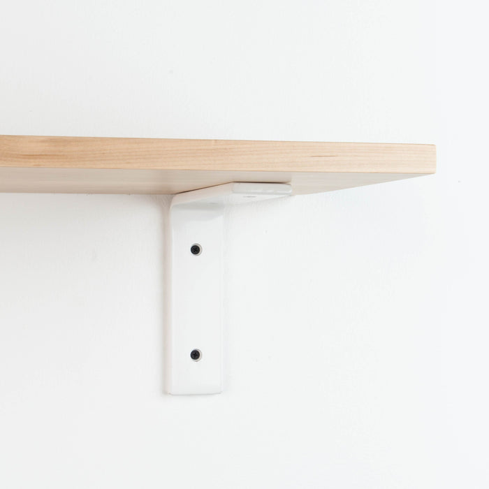 Leif Maple Wall Shelf with smooth maple glue-up and white metal L bracket for clean, minimalist floating shelf support