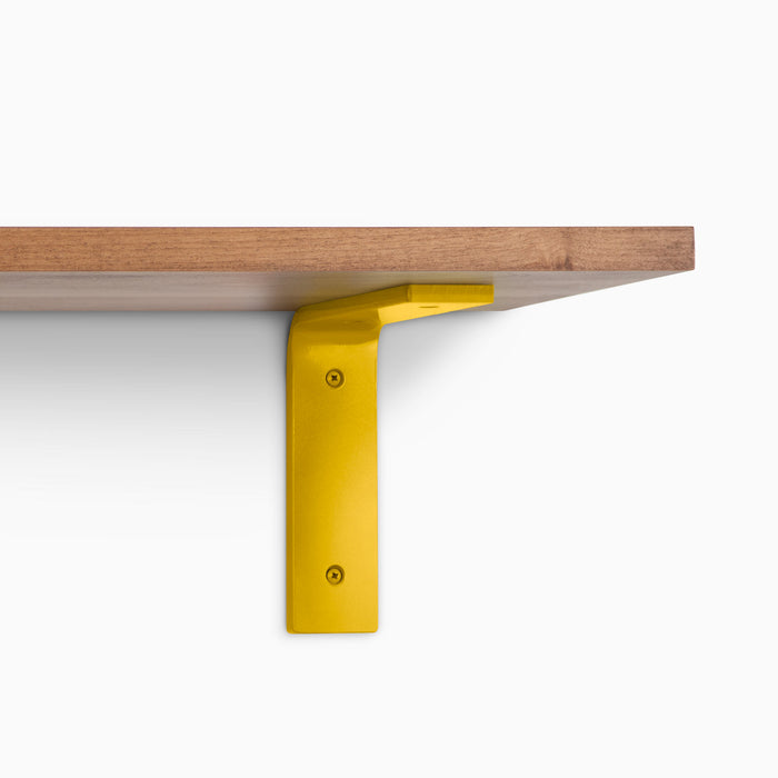 Leif Nutmeg Wall Shelf with satin clear alder wood and vibrant yellow metal L bracket for sturdy floating shelf support