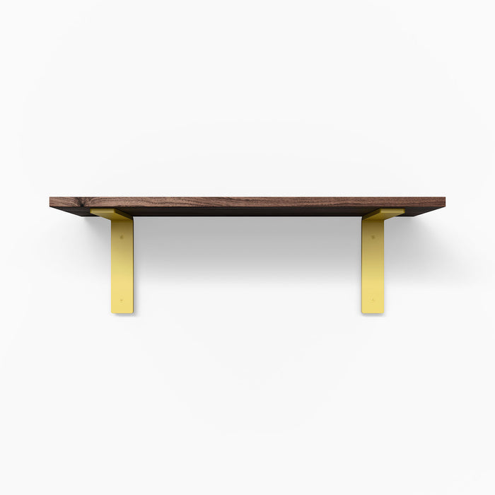 Leif Walnut Wall Shelf with rich walnut glue-up and bold yellow metal floating shelf brackets for minimalist wall display