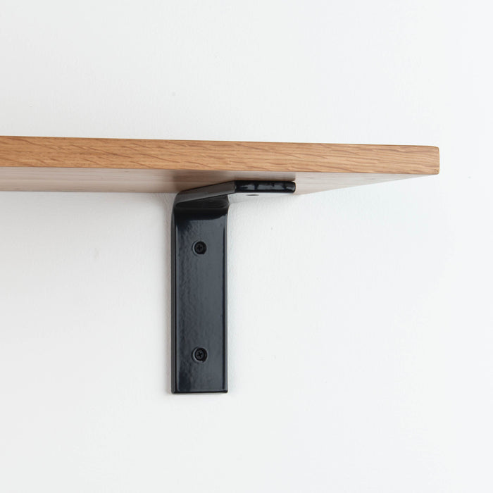 Leif White Oak Wall Shelf with white oak glue-up and durable black metal bracket for a sleek floating wall display