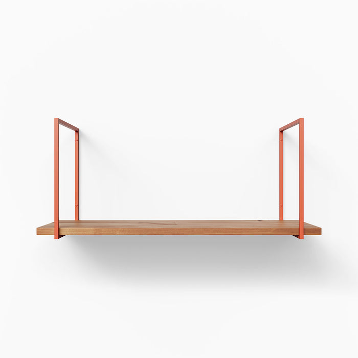 Lloyd Alder Tiered Shelf with warm alder wood ledge and minimalist rust-colored metal floating shelf brackets for modern display