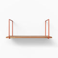 Lloyd Alder Tiered Shelf with warm alder wood ledge and minimalist rust-colored metal floating shelf brackets for modern display