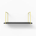 Lloyd Black Tiered Shelf with sleek black ledge and vibrant yellow metal floating shelf brackets for modern wall display