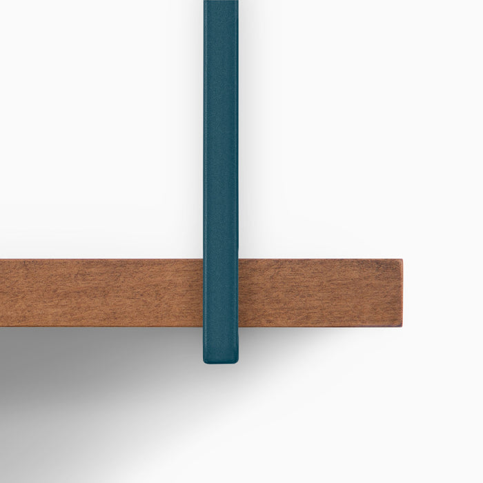 Lloyd Nutmeg 5 Tiered Shelf close-up showing warm wood display ledge and sleek blue metal floating shelf bracket detail
