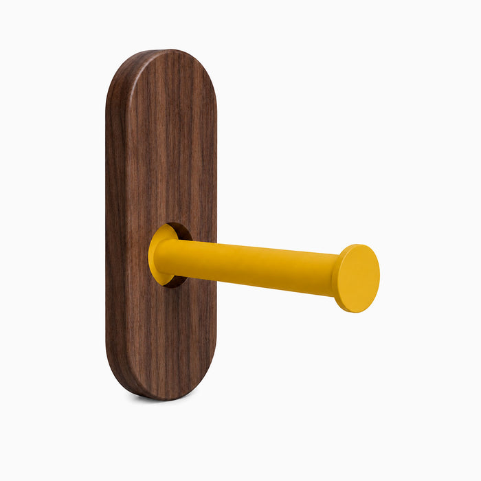 Lou Toilet Paper Holder featuring a solid hardwood backplate with a durable mustard yellow metal arm, designed for minimalist wall organization and style.