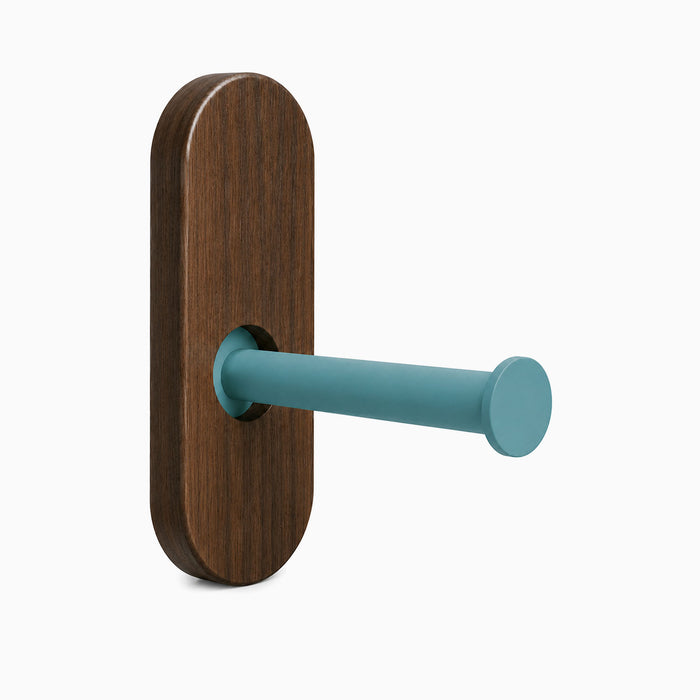Lou Toilet Paper Holder with a solid walnut wood base and a modern matte blue steel arm, combining minimalist design with durable materials.