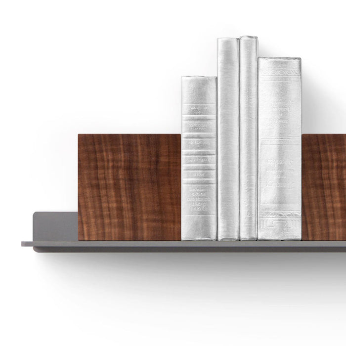 Maggie Square Magnetic Bookend (Set of Two) in solid hardwood with magnets securing books on a minimalist metal shelf