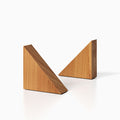 The Maggie triangle Product (alder finish) pictured against a white background. Two bookends positioned in the center, one slightly off center, in front of the other.