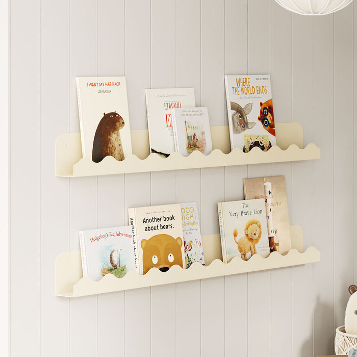 Mini Wave Picture Ledge in soft cream with wave-patterned display ledges showcasing children's books on a light wall