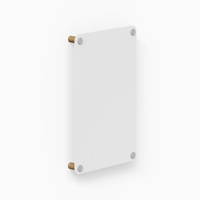 Morgan Magnet Board with minimalist white magnetic surface mounted on wood and metal hardware, designed for functional wall organization.