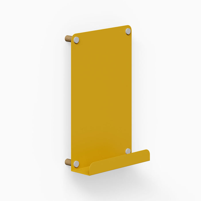 Morgan Magnet Ledge Board in honey mustard with stainless steel accents, a minimalist wall display ledge for organizing and showcasing items.