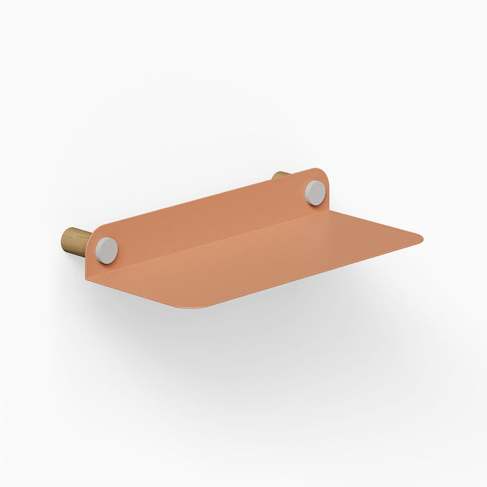 Minimalist Morgan Basic Shelf with a rust-resistant metal surface in warm clay tone and solid hardwood wall brackets for durable, functional wall shelving.