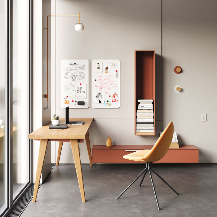 Mosey Dry Erase Board with smooth white surface mounted on wall in minimalist workspace with desk and chair