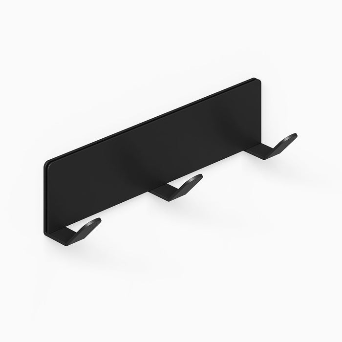 Of Course Wall Hook in sleek black metal features three functional hooks designed for minimalist, durable, and organized wall storage.