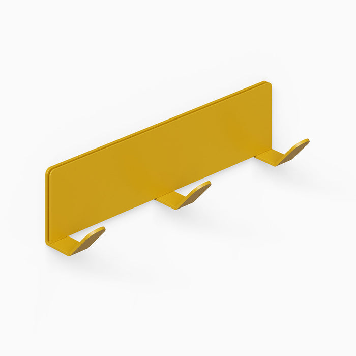 Of Course Wall Hook in matte yellow finish, minimalist metal wall hook with three curved hooks for organizing coats, bags, or accessories.