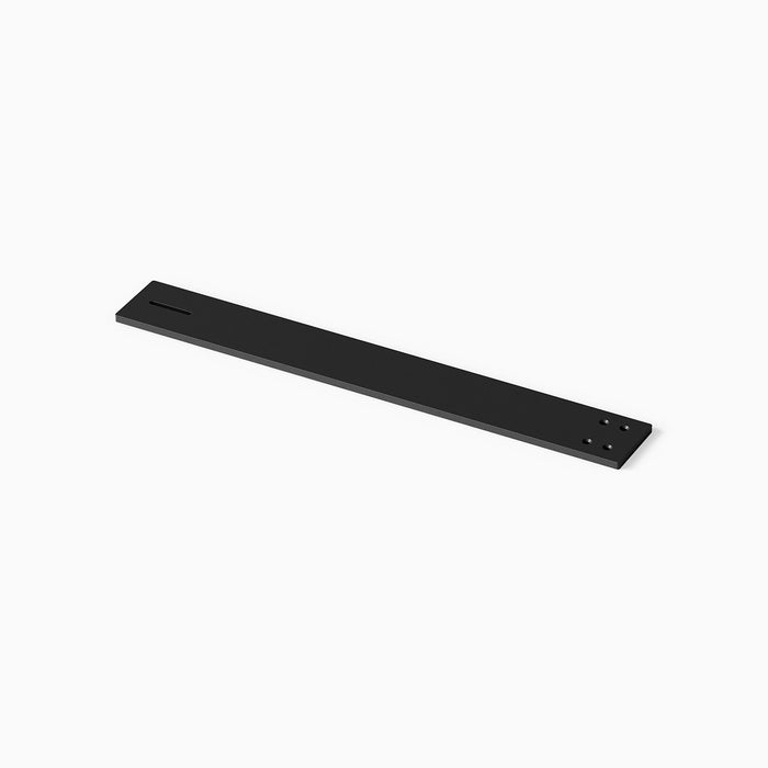 Otto Countertop Bracket in matte black steel with a streamlined rectangular design featuring mounting holes for secure installation of custom floating shelves and ledges.