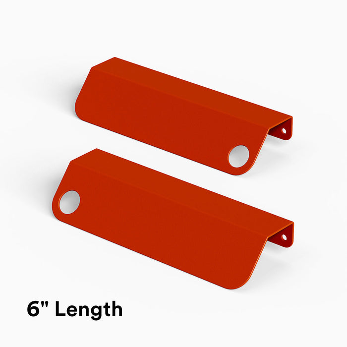 Peek Cabinet Pull in bold red steel with circular cutout for sleek, modern hardware and functional cabinet organization
