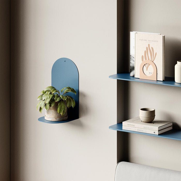 Perch Round Plant Shelf in matte blue steel with compact design for modern wall display and organization