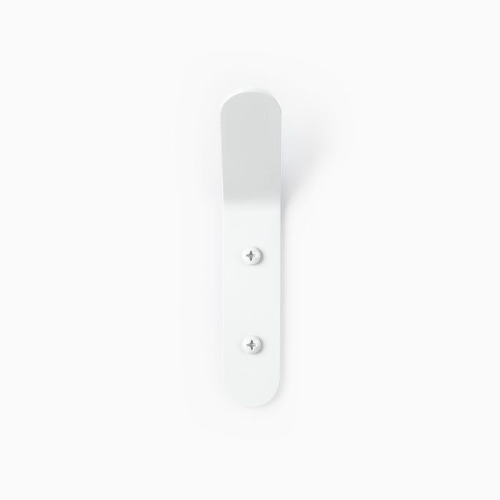 Popsicle Wall Hook in matte white steel with minimalist design and durable mounting hardware by Shelfology
