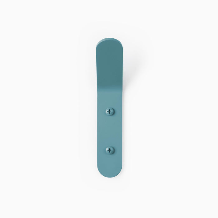 Popsicle Wall Hook in steely blue steel with minimalist curved design and durable mounting screws by Shelfology