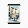 RADius Magnetic Print Hanging System in matte black steel holding a detailed urban watercolor scene with soft sunlight contrasts