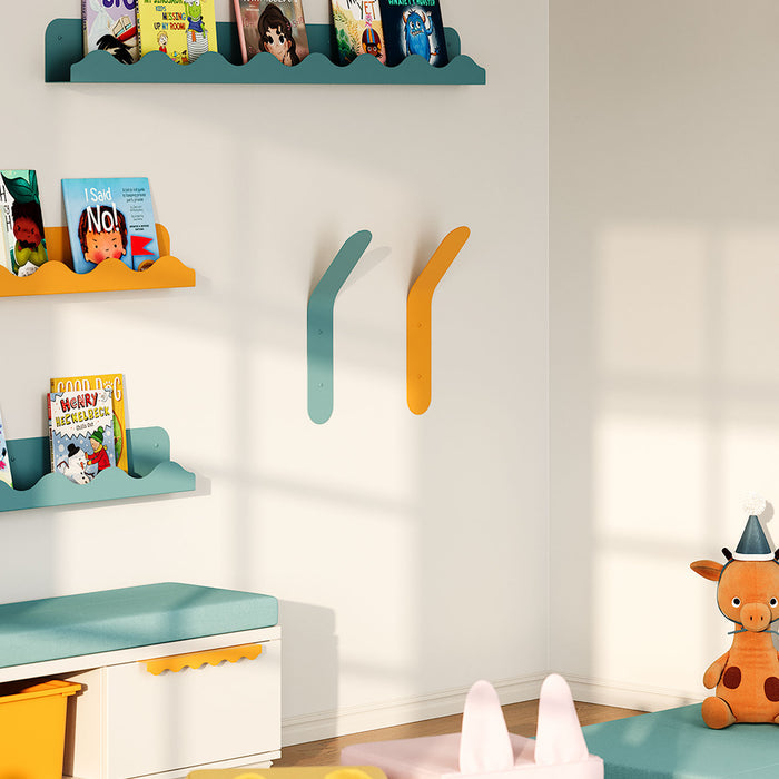Really Big Popsicle Wall Hook in teal and orange colors mounted on a neutral wall in a playful kids’ room setup