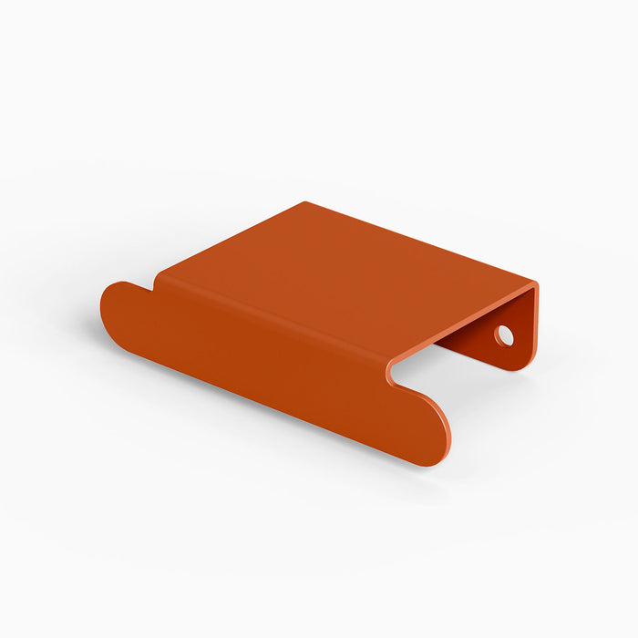 Rem Cabinet Pull - Center in warm burnt orange with clean, functional design for durable, stylish shelf and wall hardware