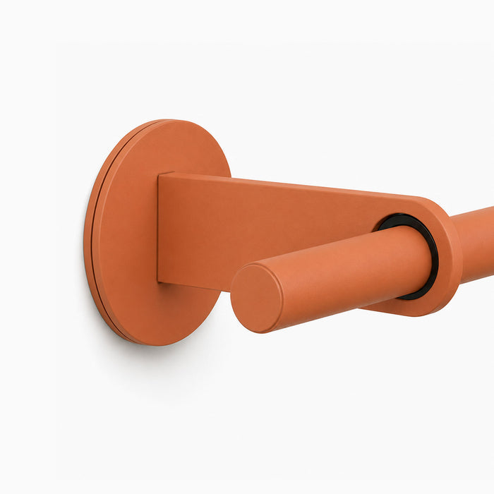 Close-up of the Ringo Curtain Rod Kit in matte clay finish mounted on a wall, showcasing minimalist metal design and durable rust-resistant hardware.