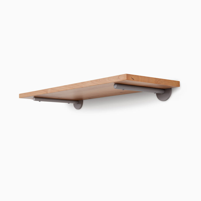 Roderick Alder Wall Shelf featuring smooth alder wood with arsenic gray metal floating brackets for sleek wall organization