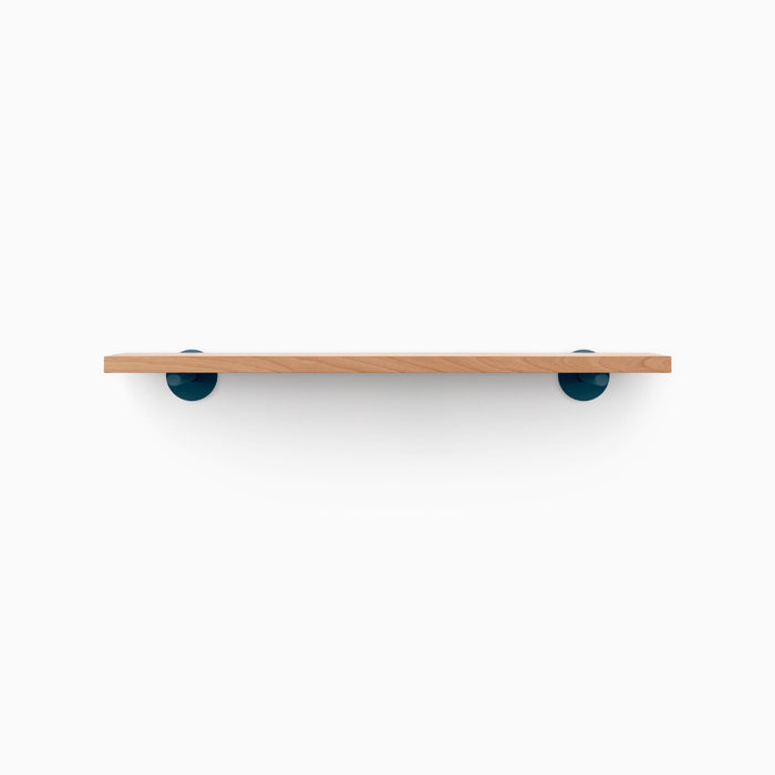 Roderick Alder Wall Shelf with natural alder wood and deep blue round metal floating shelf brackets for minimalist display and organization