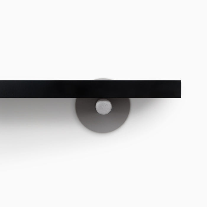 Roderick Black Wall Shelf with smooth black hardwood and discreet arsenic gray metal floating shelf brackets for minimalist display