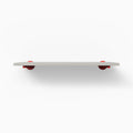 Roderick Concretey Wall Shelf with smooth concrete surface and bold red metal floating shelf brackets for modern display