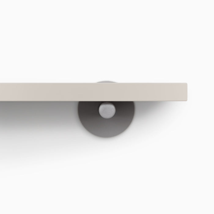 Roderick Concretey Wall Shelf with smooth concrete surface and sleek arsenic gray metal floating shelf bracket for modern display