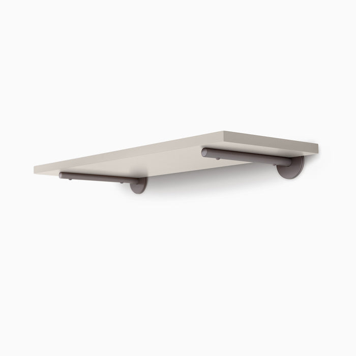 Roderick Concretey Wall Shelf with smooth concrete surface and discreet arsenic gray metal floating shelf brackets for minimalist display