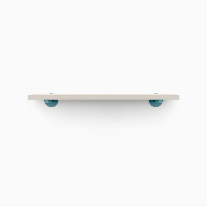Roderick Concretey Wall Shelf with smooth concrete surface and teal metal floating shelf brackets for functional wall display