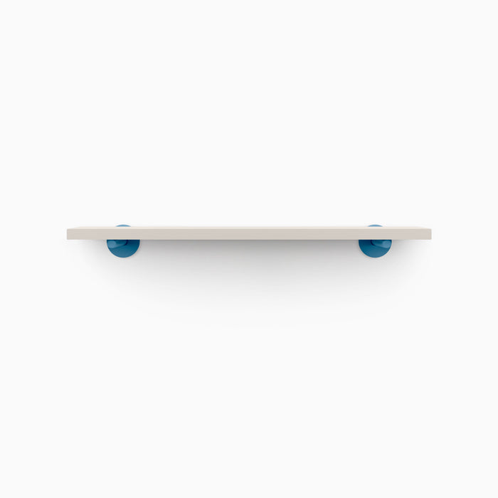 Roderick Concretey Wall Shelf with smooth concrete surface and vibrant blue metal floating shelf brackets for stylish display