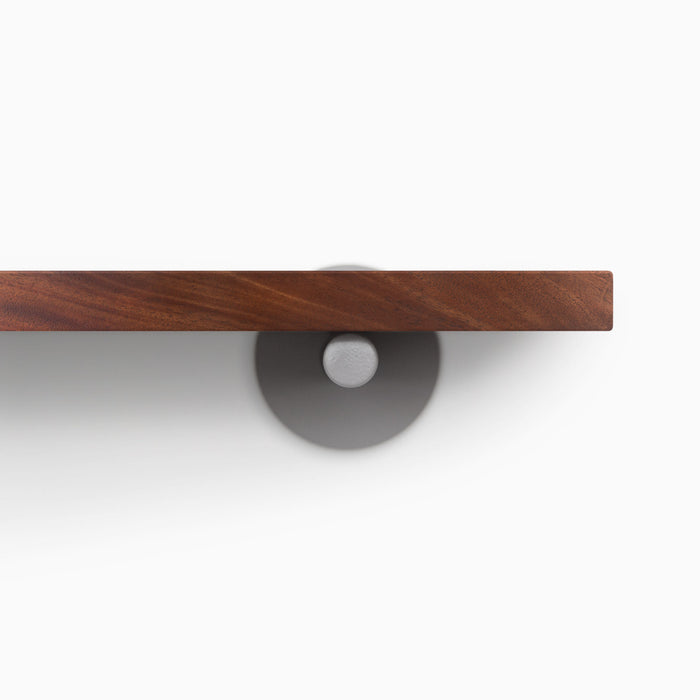 Roderick Dutch Mocha Wall Shelf with rich mocha hardwood and sleek round arsenic gray metal floating shelf bracket detail