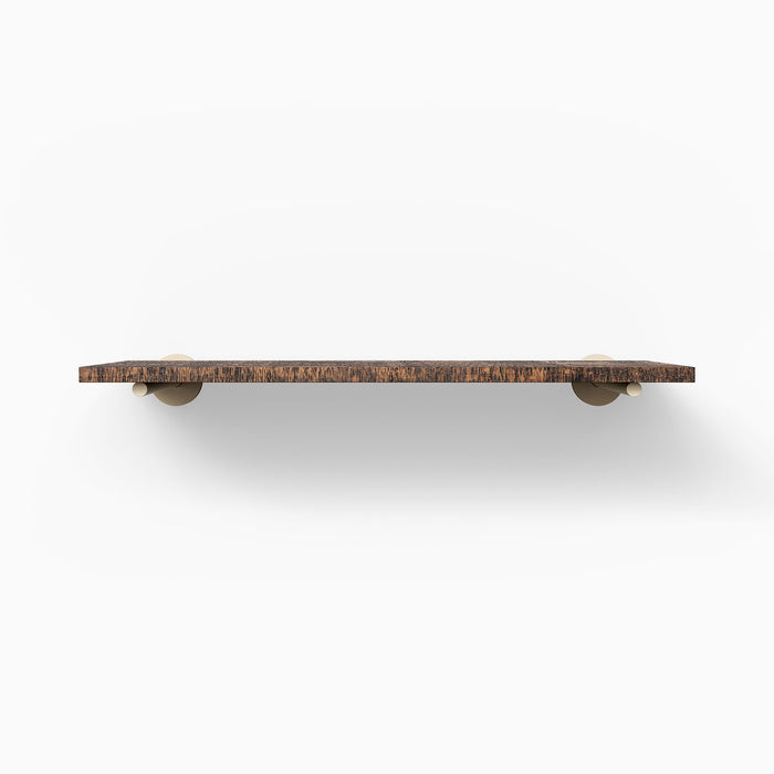Front view of Roderick wall shelf in rough nutmeg finish with solid alder wood and Dune brackets, modern thin profile