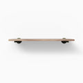 Roderick Glazed White Oak Wall Shelf with smooth white oak and minimalist dark metal floating shelf brackets for sleek display