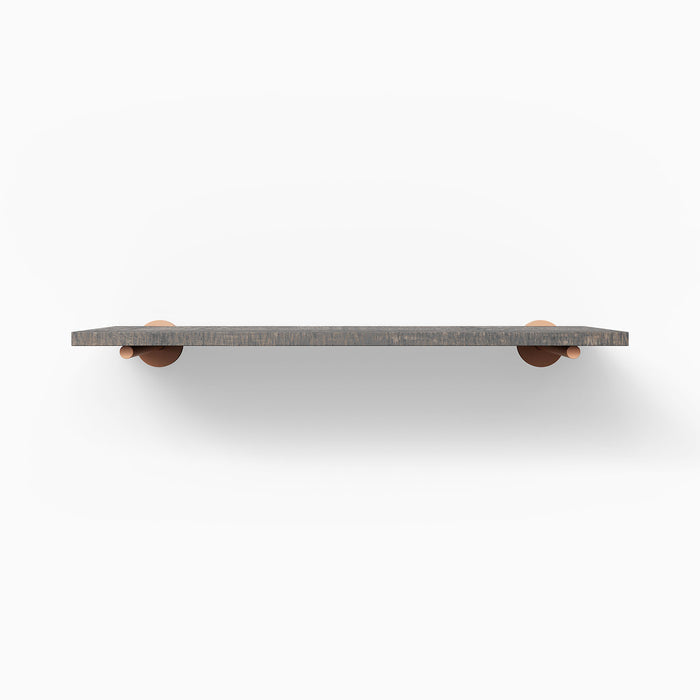 Roderick Hatch Grey Rustic Wall Shelf with textured grey hardwood and round copper metal floating shelf brackets for subtle display